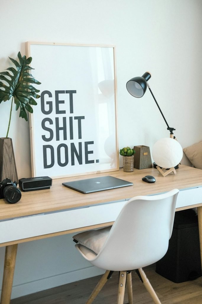 brown-and-white-wooden-desk-with-chair-and-laptop-lb9ylp8e9sg